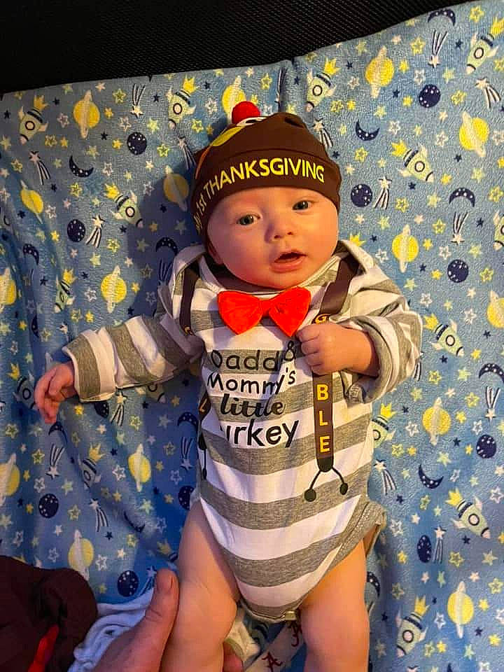 Abel joined the competition — help win amazing prizes! baby, baby_toddler_clothing, baseball_cap, cap, child, electric_blue, fun, headwear, human_body, human_leg, knee, outerwear, pattern, person, personal_protective_equipment, sitting, sleeve, t_shirt, textile, thigh