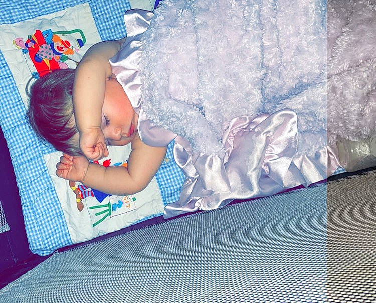 Lyric joined the competition — help win amazing prizes! azure, baby, baby_products, baby_toddler_clothing, bedding, bedtime, child, comfort, electric_blue, flooring, headwear, lap, leisure, linens, pattern, person, pink, purple, room, sitting