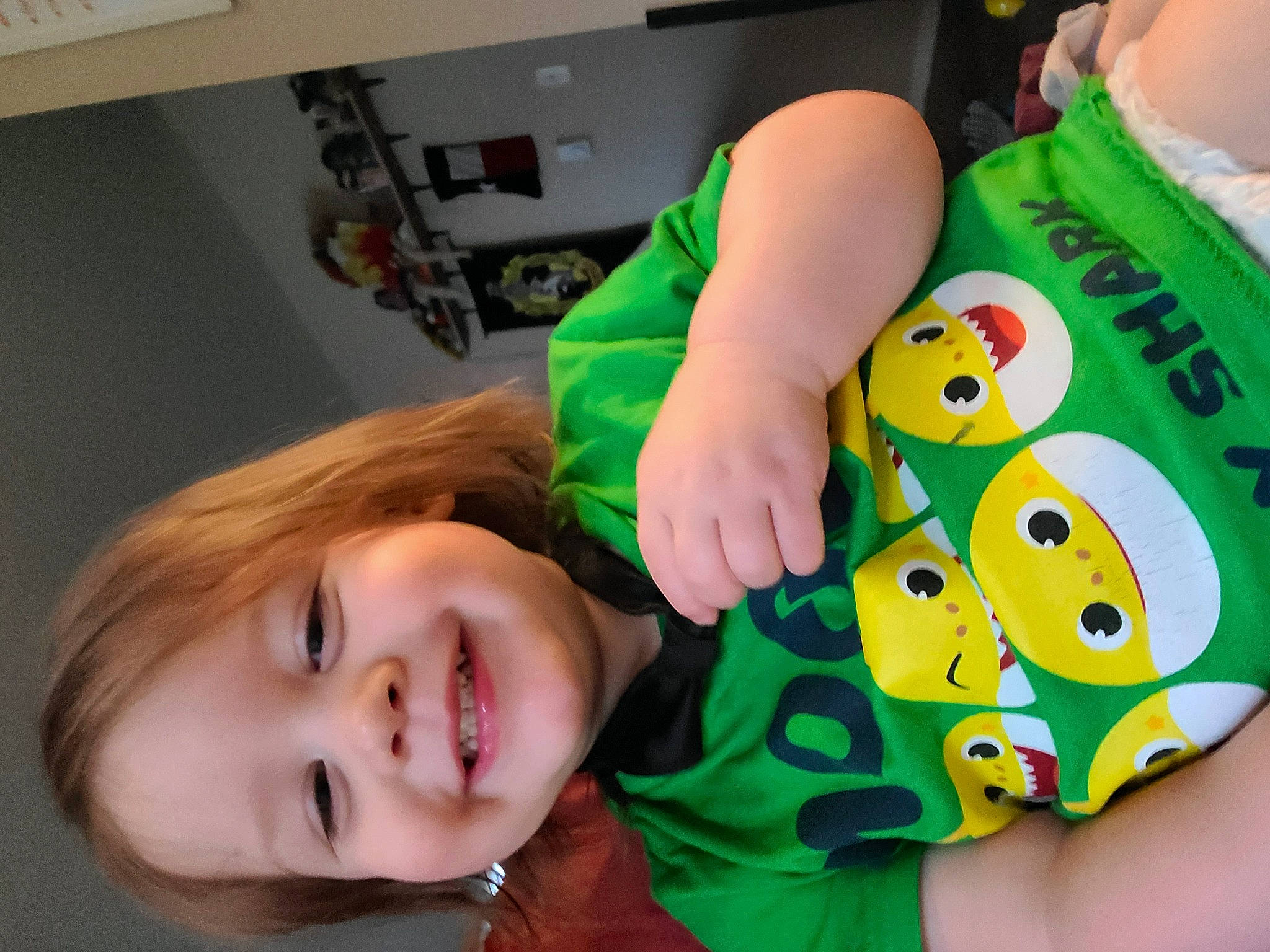 Nita joined the competition — help win amazing prizes! bangs, child, fun, happy, joy, nail, person, personal_protective_equipment, play, plush, room, sleeve, smile, stuffed_toy, t_shirt, toddler