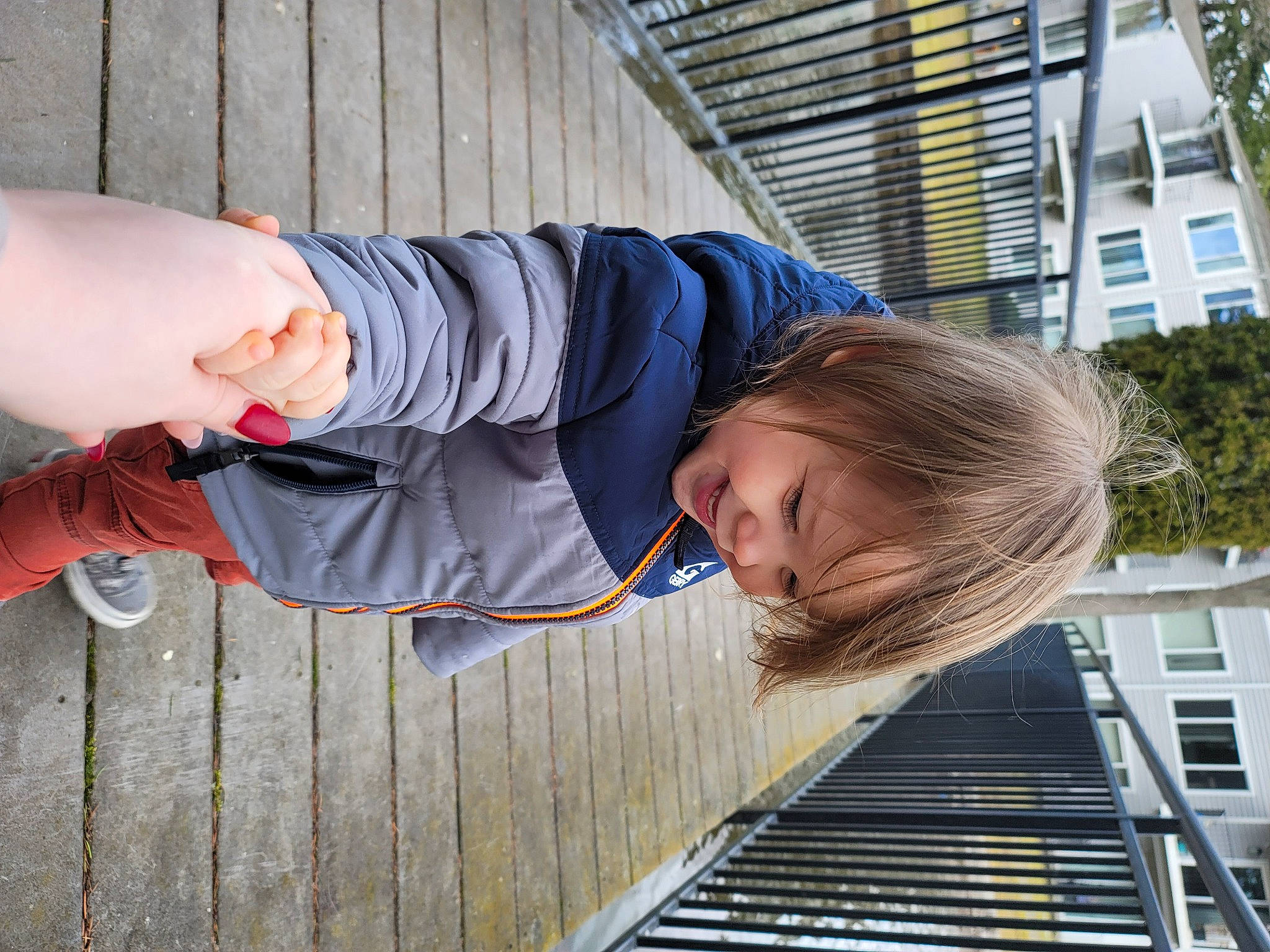 Nita joined the competition — help win amazing prizes! baby_toddler_clothing, building, child, composite_material, dress_shirt, fun, gesture, happy, leisure, pattern, person, sleeve, smile, thumb, toddler, tree, vacation, window, wood, wrist