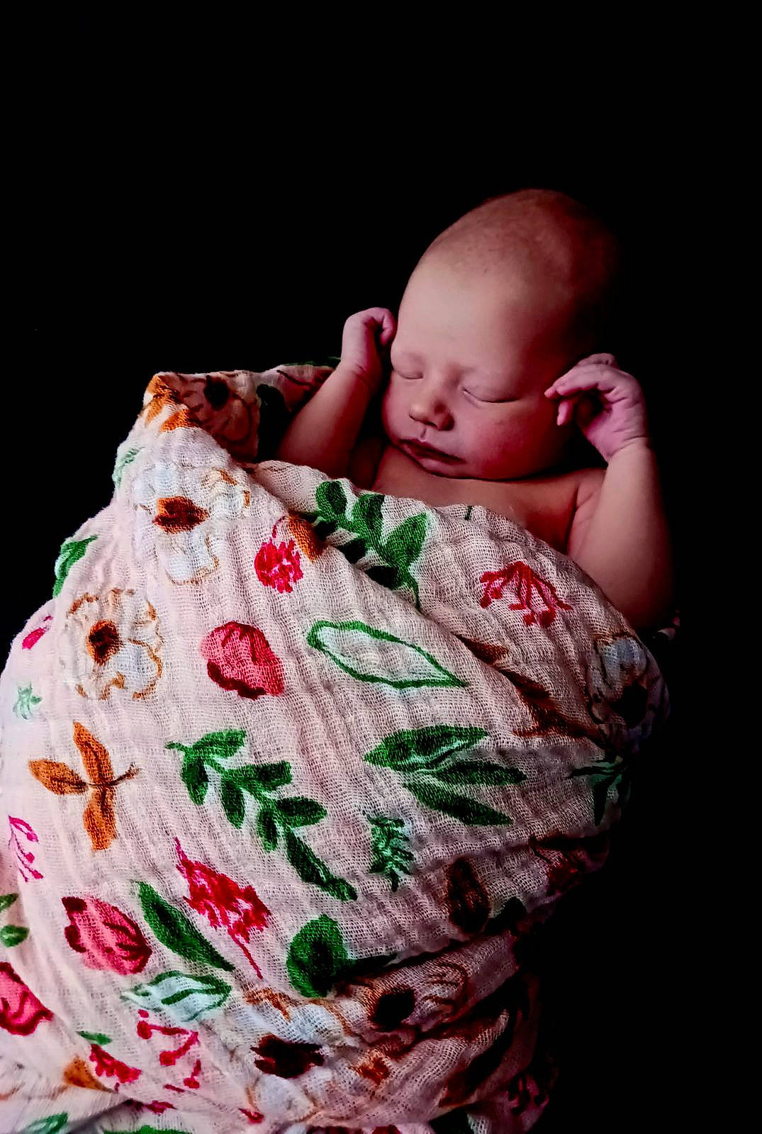 Victoria is registered to the contest to win money with this photo: baby, baby_toddler_clothing, cheek, chin, collar, comfort, event, flash_photography, gesture, happy, human_body, linens, lip, pattern, person, pink, plant, skin, sleeve, t_shirt