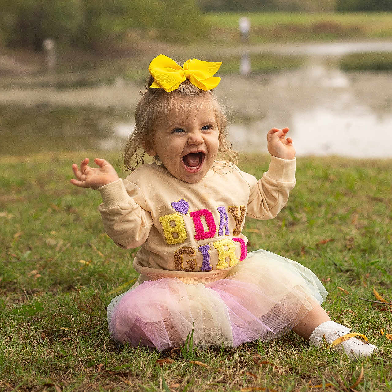Birdie joined the competition — help win amazing prizes! bodypart, child, clothing, dress, face, female, finger, flower, girl, grass, hand, happy, head, lawn, outdoors, person, photography, plant, portrait, sitting