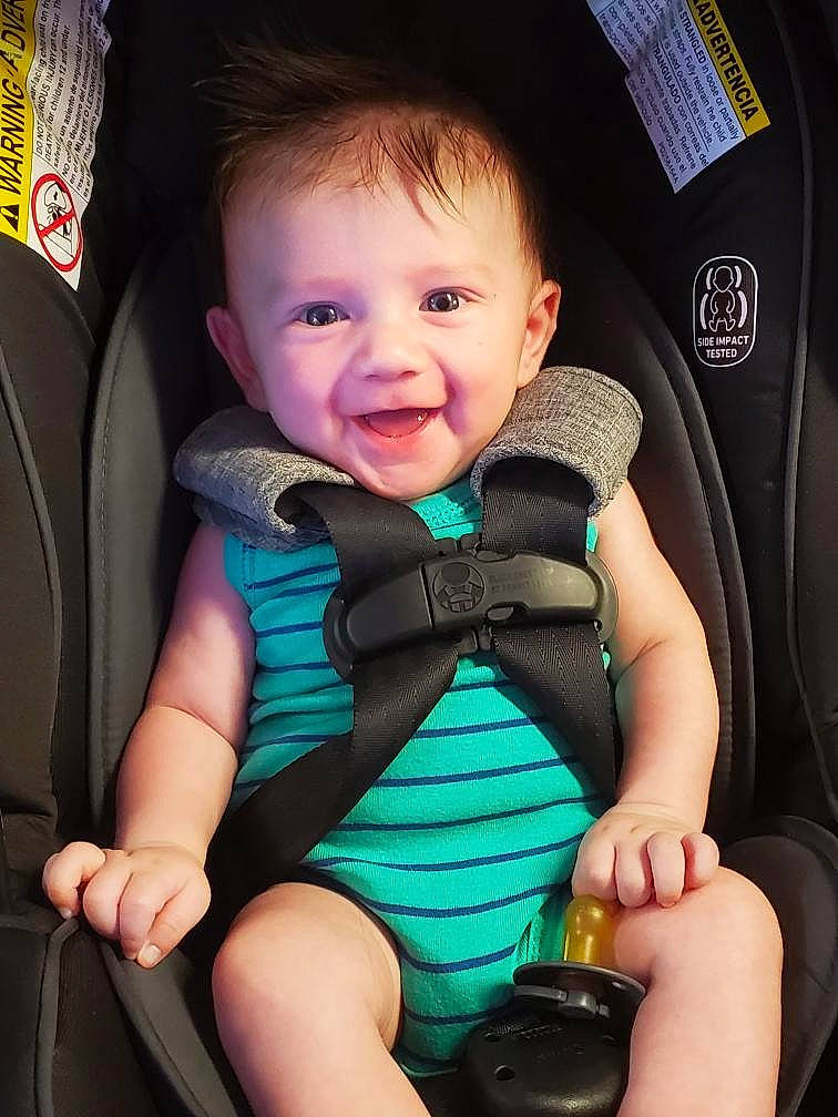 Dante joined the competition — help win amazing prizes! arm, auto_part, baby, baby_carriage, baby_in_car_seat, baby_toddler_clothing, black, blue, car_seat, cheek, comfort, finger, green, hand, joy, organ, person, product, seat_belt, skin