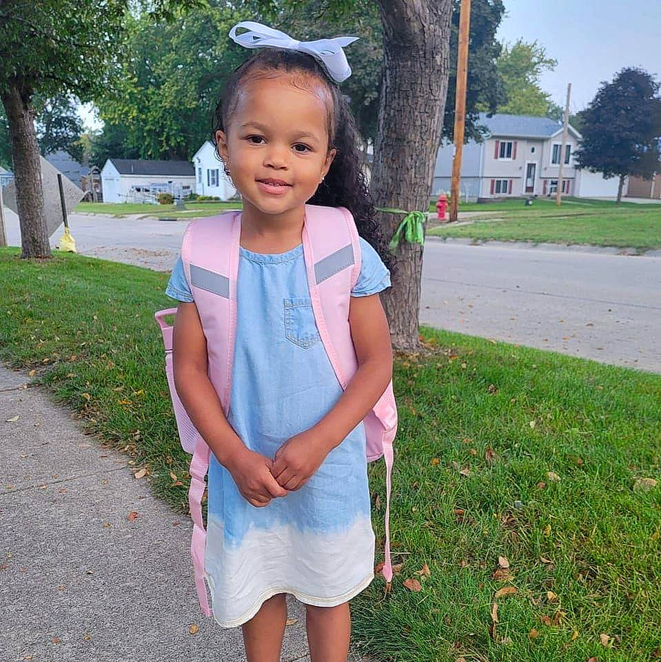 Zariah is registered to the contest to win money with this photo: baby_toddler_clothing, denim, dress, electric_blue, fashion_accessory, fun, grass, happy, jewellery, joy, leisure, pattern, person, plant, recreation, sleeve, smile, spring, summer, toddler