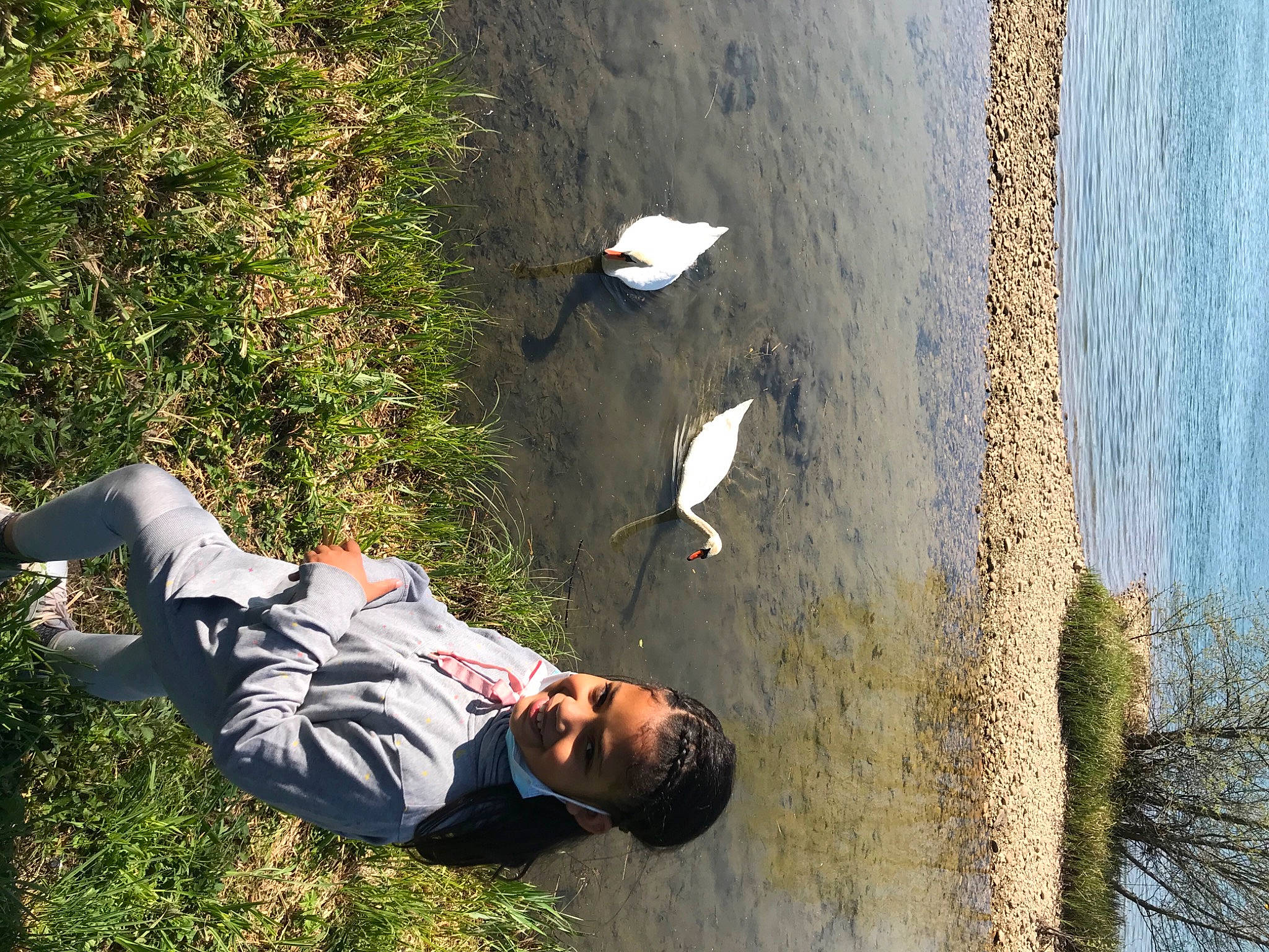 Christina participe au concours pour gagner de l'argent avec cette photo : bank, branch, grass, grass_family, happy, joy, lake, landscape, leisure, morning, nature, people_in_nature, person, plant, recreation, sunlight, tree, vertebrate, water, watercourse