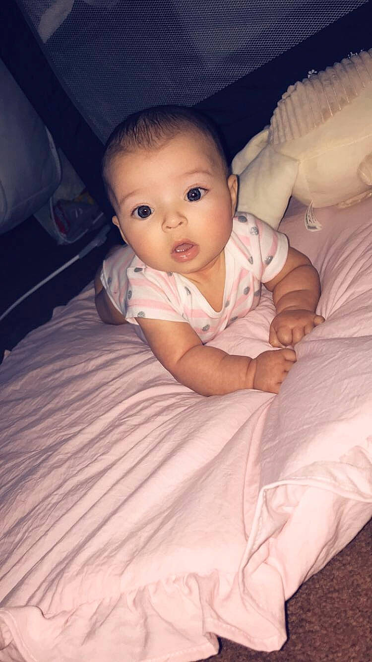 Georgina joined the competition — help win amazing prizes! arm, baby, beauty, cheek, child, chin, eye, face, head, iris, leg, lip, mouth, nose, person, product, sitting, skin, smile, surprise