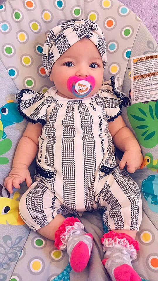Georgina is registered to the contest to win money with this photo: baby, baby_products, baby_toddler_clothing, baby_toys, cheek, child, design, doll, headgear, joy, pattern, person, play, product, smile, stuffed_toy, textile, toddler, toy