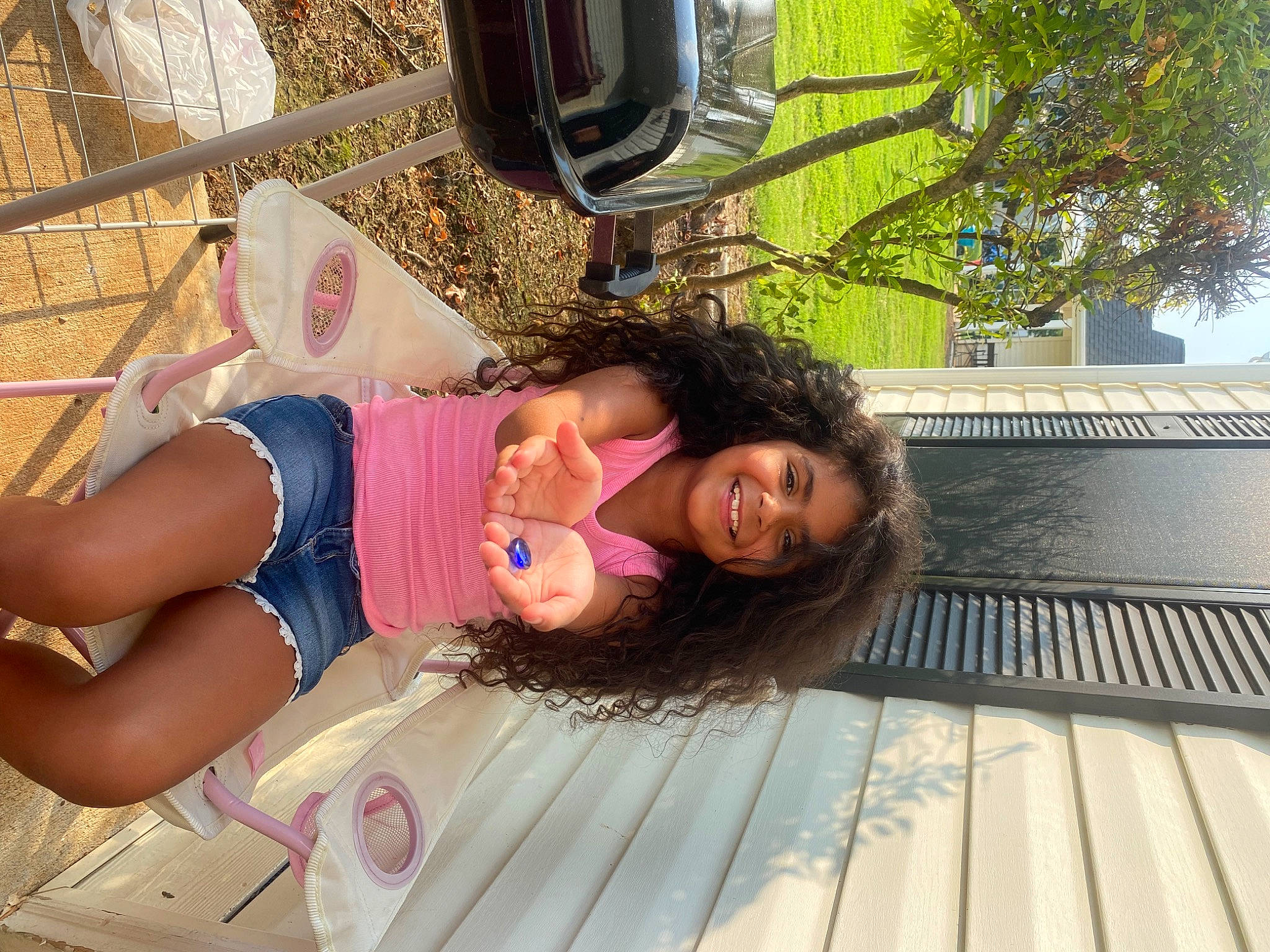 Aliyana joined the competition — help win amazing prizes! automotive_lighting, comfort, eyewear, fun, happy, hat, human_leg, joy, leisure, person, plant, smile, thigh, travel, tree, wood