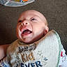 Dawson joined the competition — help win amazing prizes! baby, smile, bib, indoor, happy, child, face, clothing, toy, background, carpet, infant, cute, person, young, joyful, expression, closeup, apparel, fabric