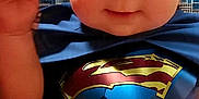 Calvin joined the competition — help win amazing prizes! baby, blue, building, cape, child, cityscape, closeup, costume, cute, eyes, face, hand, indoor, leg, portrait, red, skin, superhero, superman, yellow