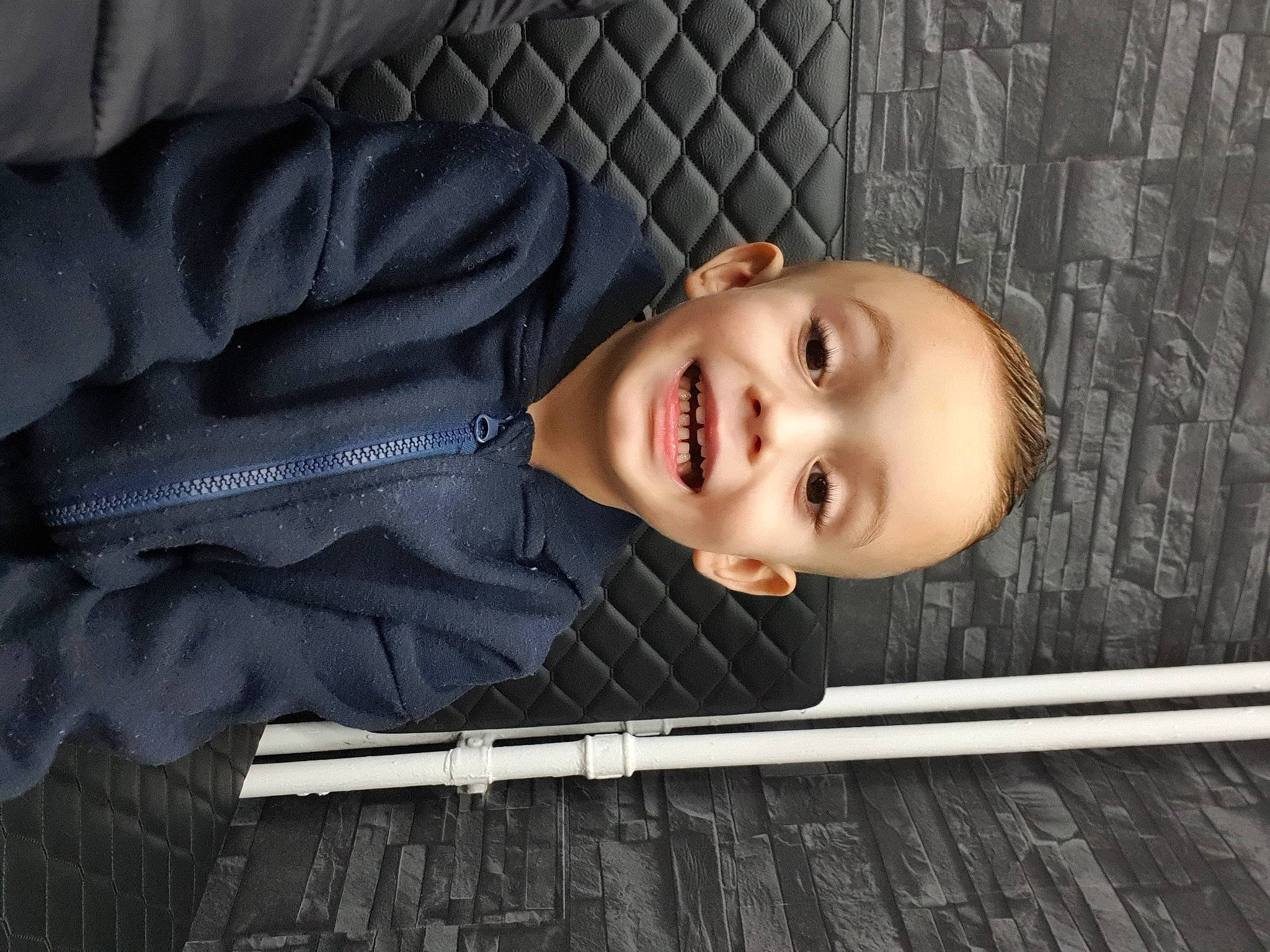 Tiago a rejoint le concours — aidez-le/la à gagner de superbes lots ! cheek, child, chin, comfort, eyebrow, face, facial_expression, flash_photography, happy, head, human_body, joy, lip, mouth, nose, person, skin, smile, standing, toddler