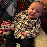 Westyn joined the competition — help win amazing prizes! baby, clothing, couch, cushion, face, furniture, head, homedecor, jeans, nature, outdoors, pants, person, photography, portrait, sitting, snow, snowman, toy, winter