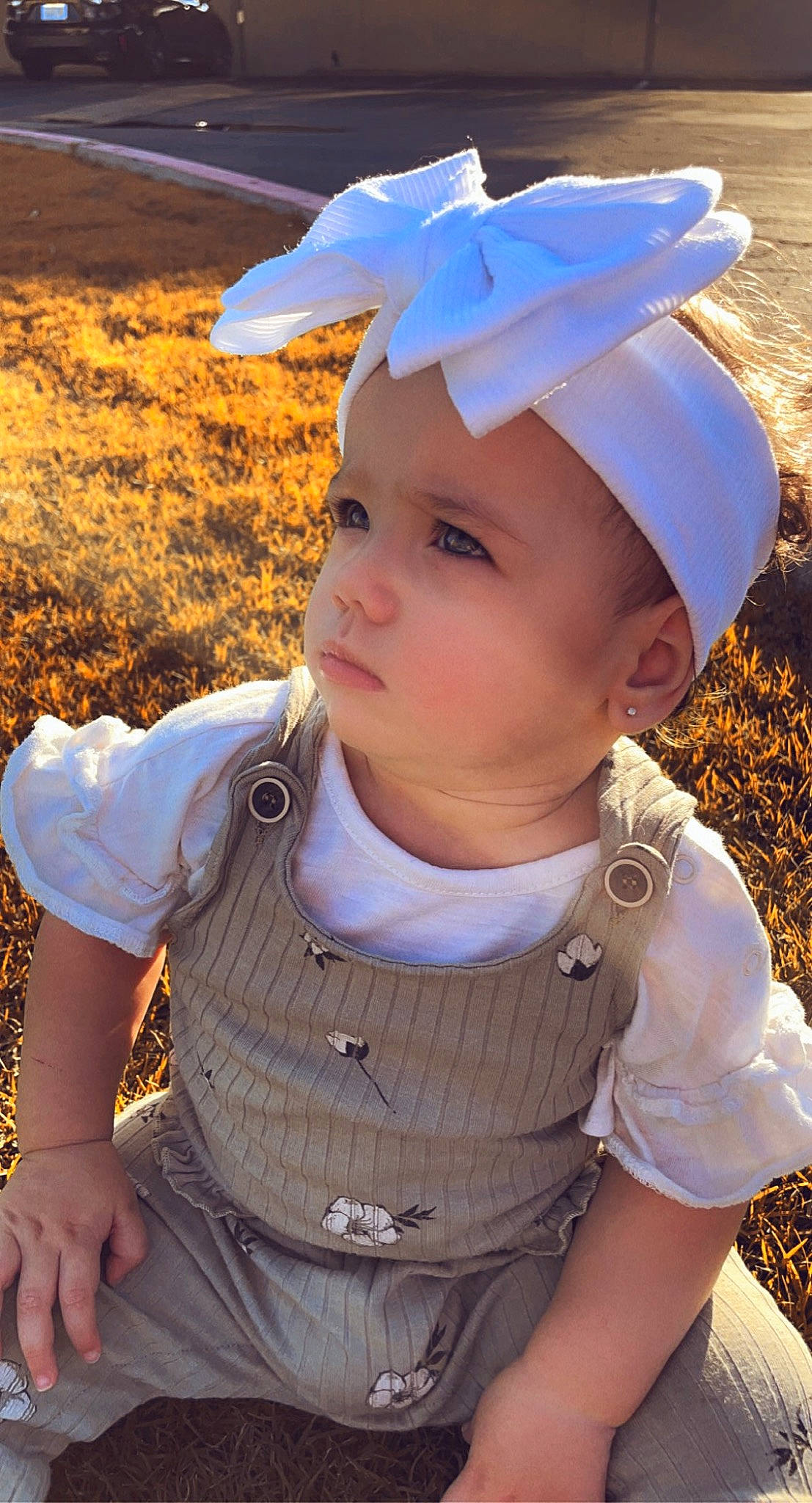 Kiyah is registered to the contest to win money with this photo: baby, baby_toddler_clothing, baseball_cap, blue, cap, cool, costume_hat, eye, face, facial_expression, grass, hairstyle, happy, hat, headwear, leaf, people, people_in_nature, person, skin