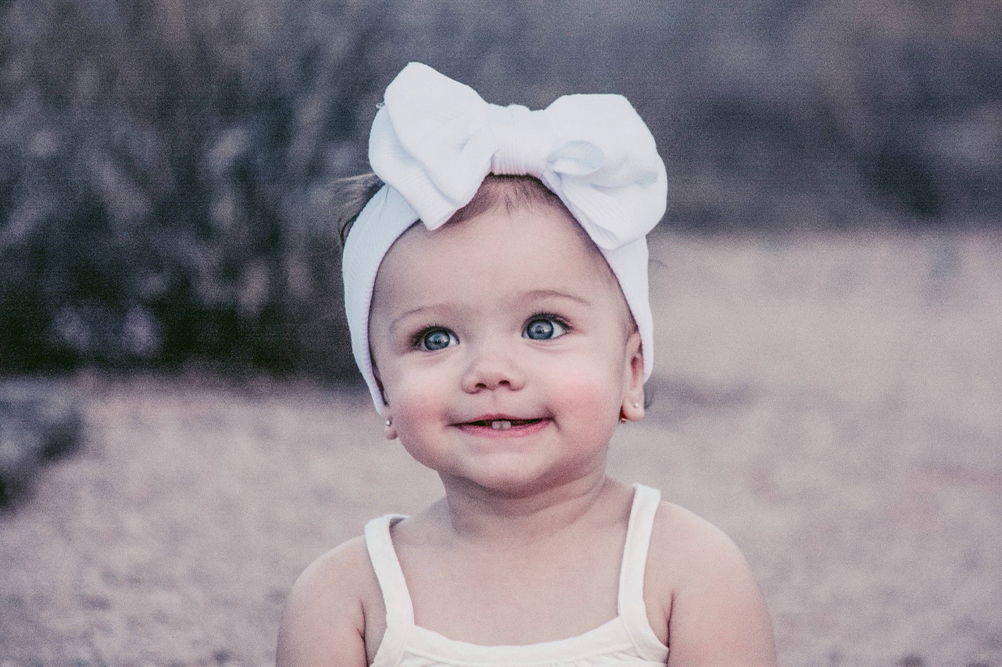 Kiyah is registered to the contest to win money with this photo: baby, baby_toddler_clothing, cap, child, chin, clothing, eye, flash_photography, grass, happy, hat, headgear, headwear, iris, joy, lip, people_in_nature, person, skin, sky