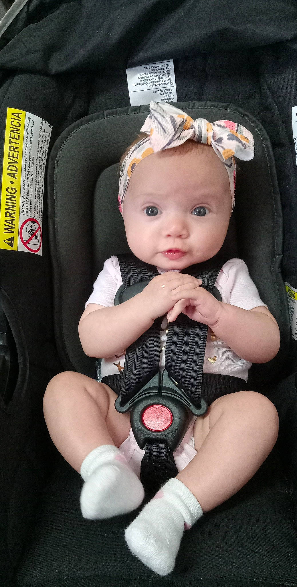 Zamora is registered to the contest to win money with this photo: auto_part, baby, baby_carriage, baby_products, baby_safety, baby_toddler_clothing, car_seat, cheek, child, comfort, eyelash, human_body, knee, nail, person, pink, product, sitting, skin, thigh