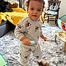 Nohan participe au concours pour gagner de l'argent avec cette photo : blanket, boots, carpet, chair, child, curtains, cute, floor, furniture, home, indoor, motion_blur, pajamas, person, playroom, reindeer_pattern, table, toddler, toy, window