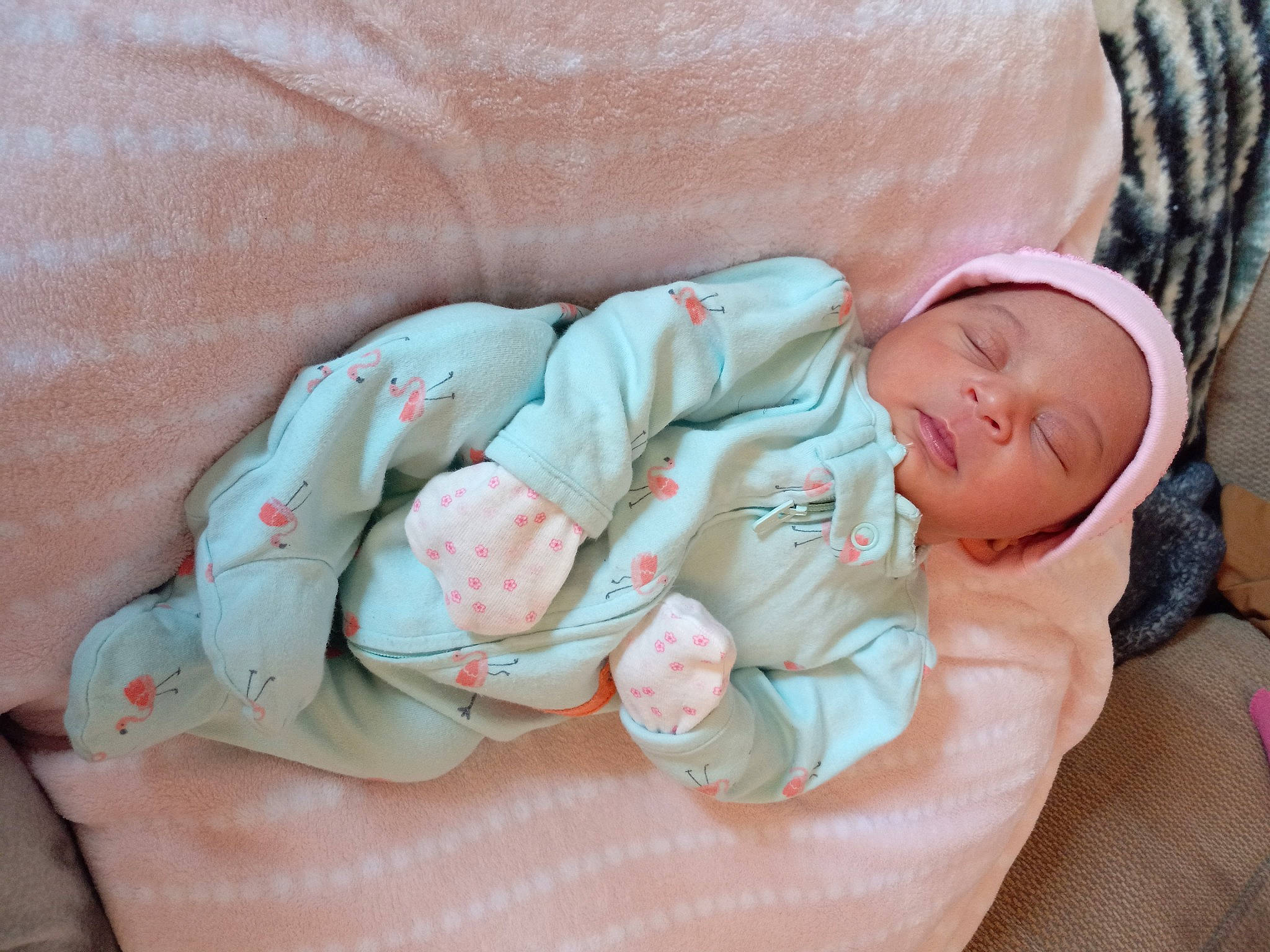 Giovanna is registered to the contest to win money with this photo: arm, baby, baby_products, baby_sleeping, baby_toddler_clothing, bedtime, cheek, child, comfort, finger, head, headwear, human_body, linens, nap, person, product, sitting, skin, sleep