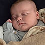 Evee is registered to the contest to win money with this photo: baby, sleeping, blanket, infant, face, peaceful, soft, cozy, child, newborn, cute, rest, closeup, skin, hand, comfort, portrait, indoors, warm, calm