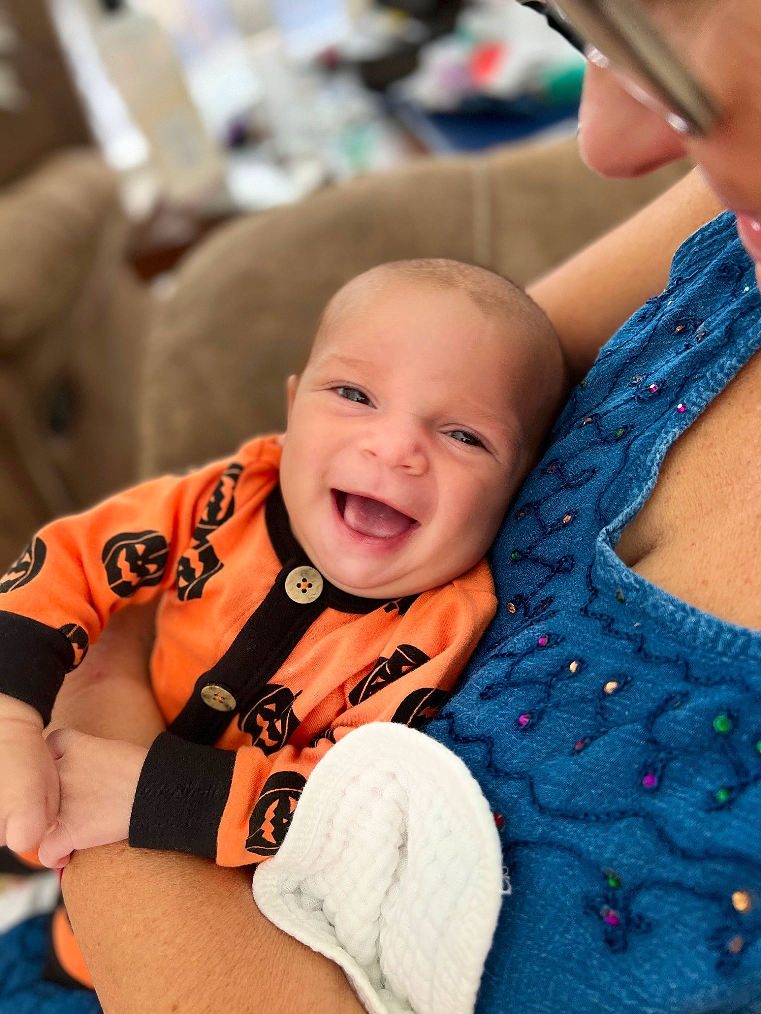 Gunner is registered to the contest to win money with this photo: baby, baby_products, baby_toddler_clothing, cheek, child, comfort, event, family, fun, happy, laugh, person, portrait_photography, room, sitting, skin, smile, toddler, vacation