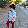 Kayden a rejoint le concours — aidez-le/la à gagner de superbes lots ! toddler, child, boy, walking, outdoor, pathway, trees, autumn, leaves, shirt, pants, boots, smiling, daylight, nature, casual_clothing, happy, side_view, young, playful