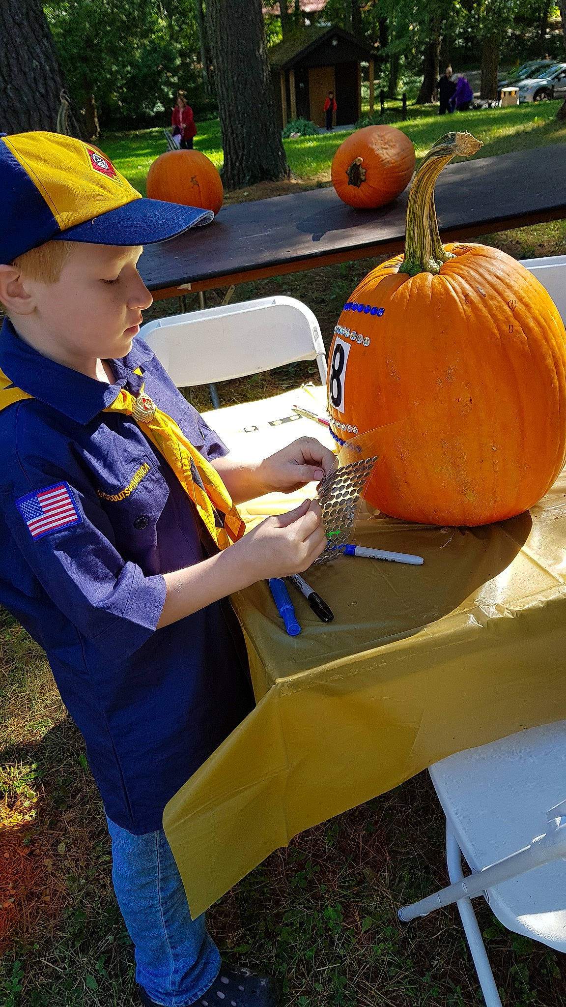 Josiah joined the competition — help win amazing prizes! calabaza, cucurbita, fruit, gourd, headwear, jack_o_lantern, local_food, person, plant, pumpkin, vegetable, winter_squash