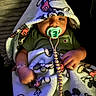 Makari joined the competition — help win amazing prizes! baby, blanket, pacifier, child, mickey_mouse, green_shirt, bracelet, cute, infant, soft_toy_pattern, wrapped, sleepy, indoor, comfort, adorable, person, clothing, toddler, resting, nap_time