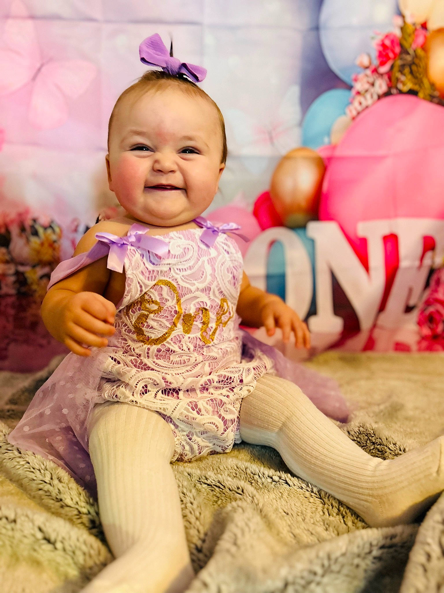 Ella joined the competition — help win amazing prizes! baby, baby_toddler_clothing, child, event, finger, foot, fun, happy, joy, leg, leisure, magenta, mammal, person, pink, play, purple, sitting, skin, smile