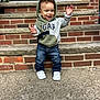 Kyrie joined the competition — help win amazing prizes! child, toddler, hoodie, jeans, sneakers, brick, stairs, smiling, outdoor, person, casual_clothing, curly_hair, concrete, happy, gesture, front_door, daylight, fashion, cute, portrait