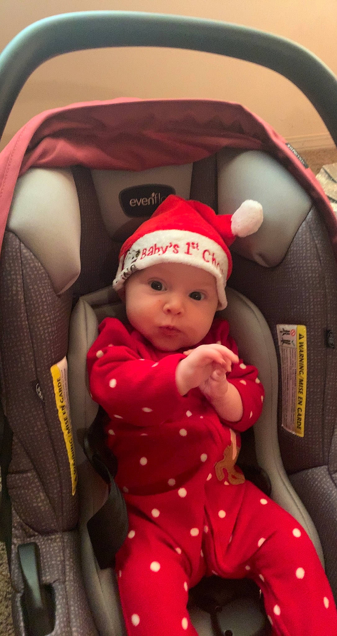 Adelaide is registered to the contest to win money with this photo: auto_part, automotive_design, baby, baby_carriage, baby_products, baby_toddler_clothing, cap, car_seat, car_seat_cover, carmine, child, comfort, family_car, head_restraint, headwear, person, personal_protective_equipment, product, seat_belt, steering_wheel