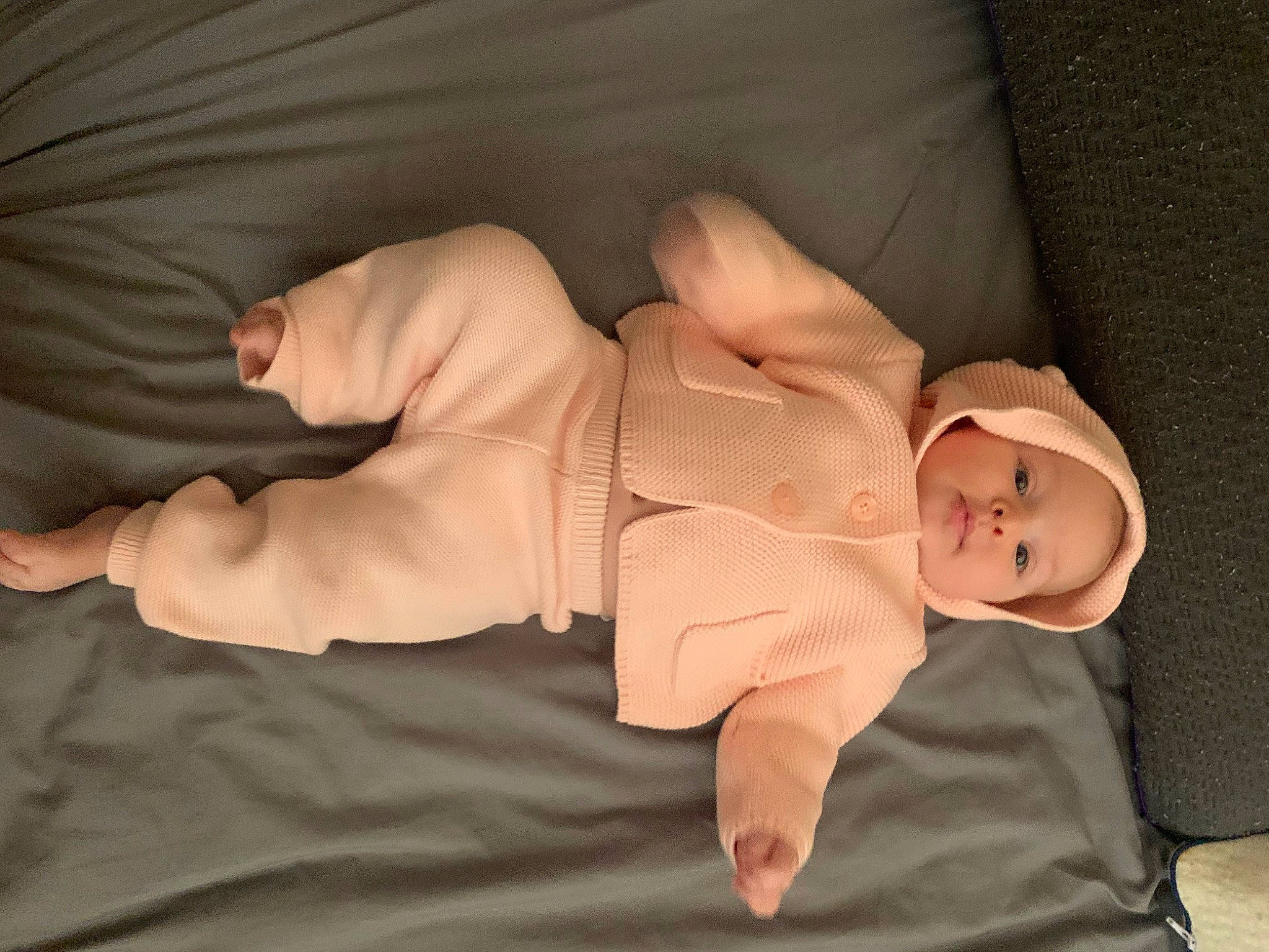 Adelaide is registered to the contest to win money with this photo: arm, baby, baby_sleeping, baby_toddler_clothing, comfort, eye, finger, gesture, hand, hat, human_body, human_leg, knee, leg, linens, person, sleeve, thumb, toddler, wood