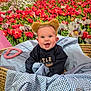 baby, child, basket, blue_checkered_fabric, bear_ears, smiling, happy, flower_background, red_flowers, white_flowers, indoor, cute, portrait, cozy, soft_toys, fabric, headwear, playful, infant, cheerful