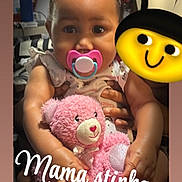 Rmani joined the competition — help win amazing prizes! baby, pacifier, teddy_bear, pink, braided_hair, child, plush_toy, sitting, cute, indoors, holding, person, hand, face, smile, sock, furniture, background, emoji, text_overlay