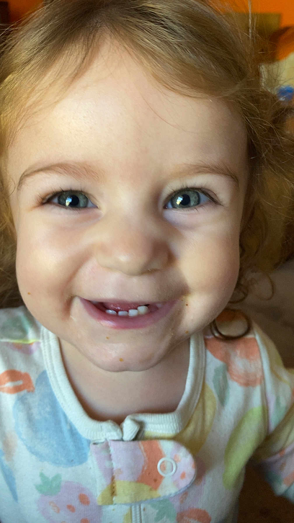 Marlee joined the competition — help win amazing prizes! toddler, child, smile, face, eyes, teeth, onesie, colorful_clothing, closeup, happy, joyful, baby, cute, portrait, indoor, natural_light, skin, hair, expression, infant