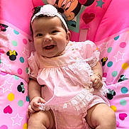 Hallie is registered to the contest to win money with this photo: baby, bouncer_seat, bow, bracelet, child, chubby_legs, dress, happy, headband, hearts, infant, lace, minnie_mouse, pattern, pink, polka_dots, portrait, sitting, smiling, stars