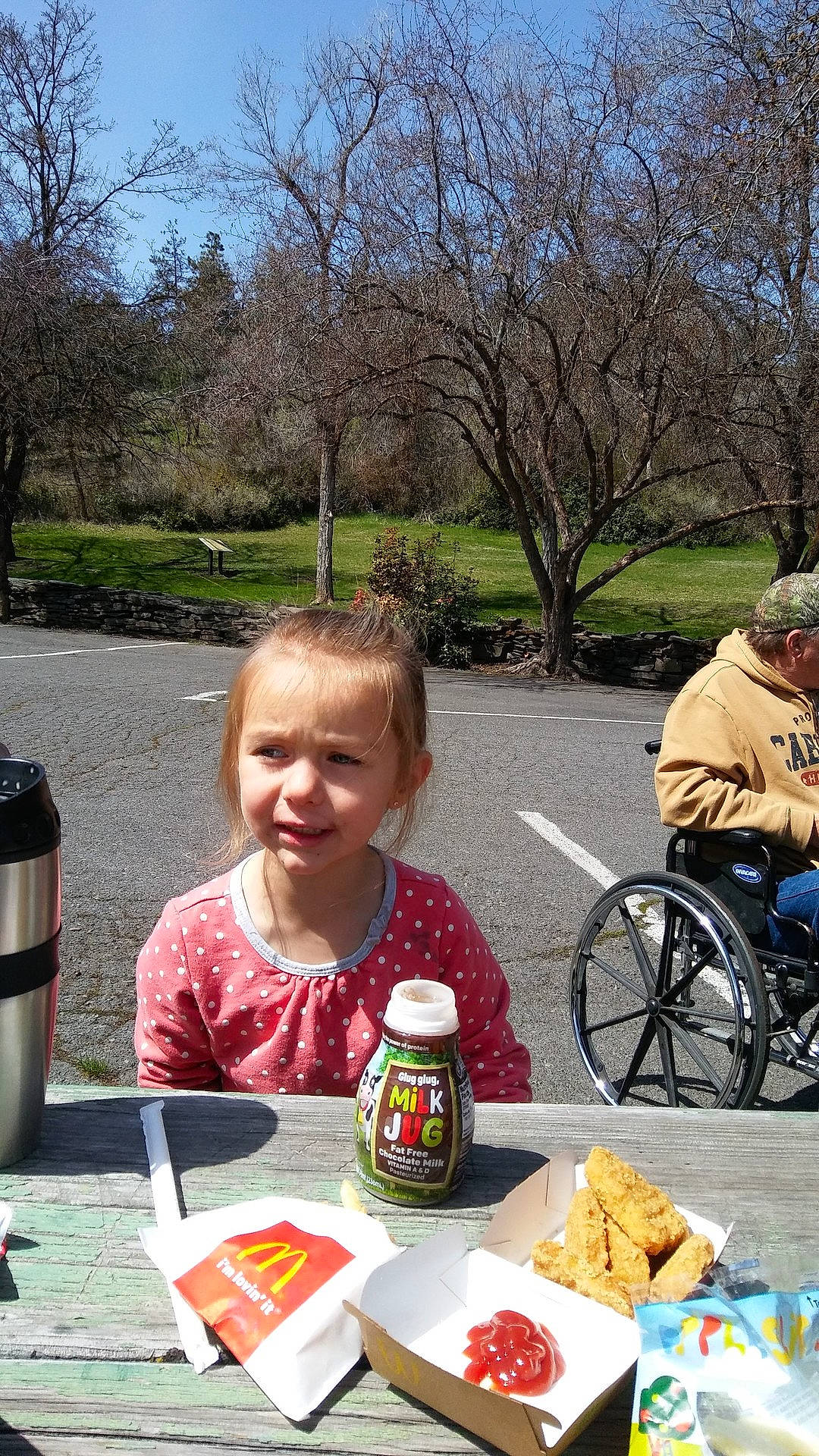 Stormy is registered to the contest to win money with this photo: child, eating, fun, lunch, person, picnic, plant, recreation, toddler, tree, vacation
