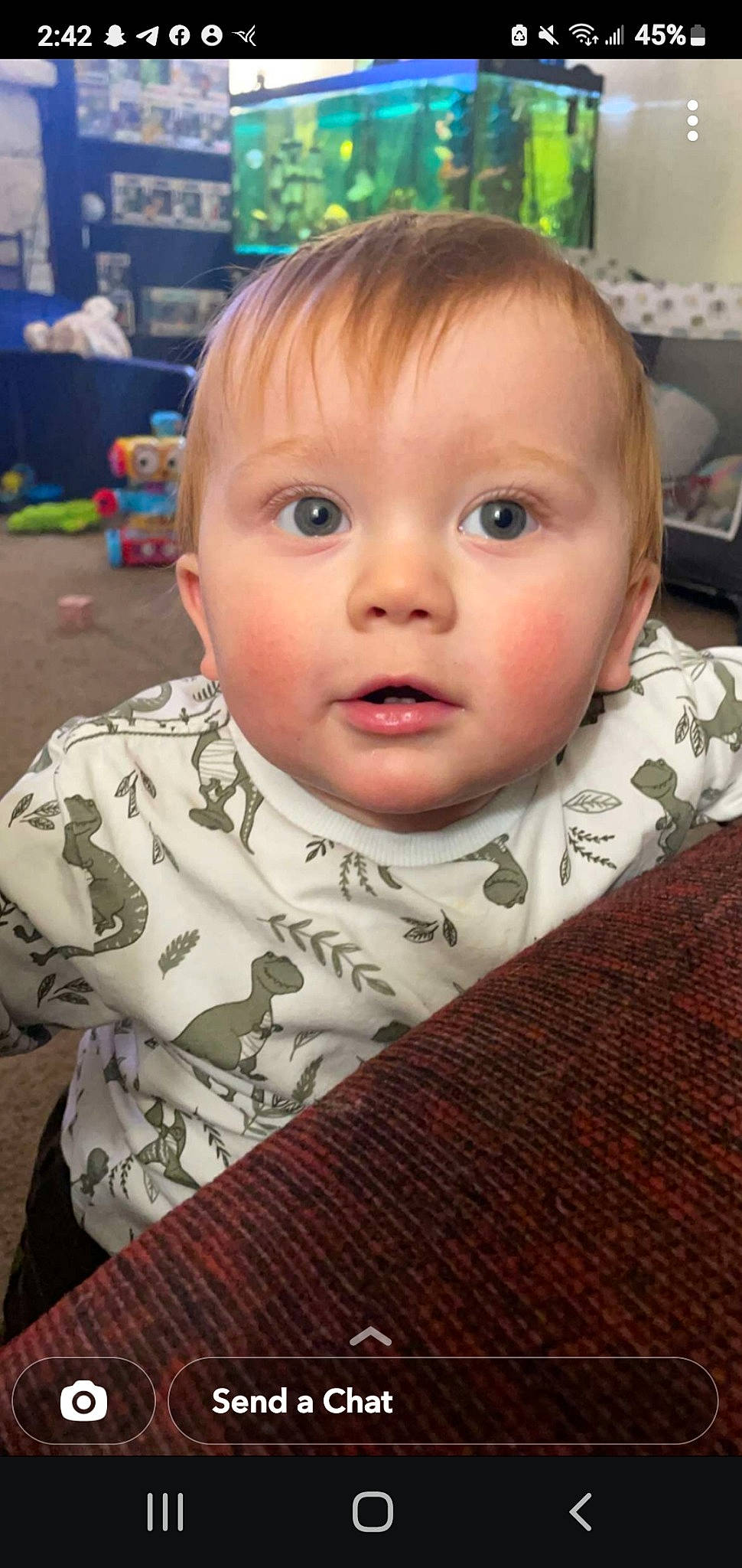 Marshall joined the competition — help win amazing prizes! baby, baby_toddler_clothing, cheek, child, close_up, comfort, eye, eyebrow, eyelash, flooring, fun, happy, iris, nose, person, room, sitting, skin, smile, toddler