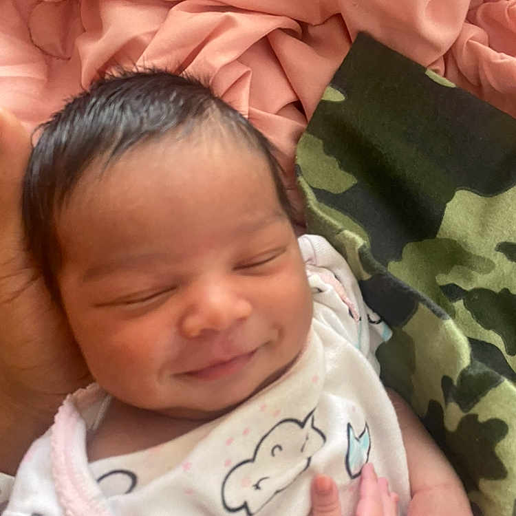 Laysia joined the competition — help win amazing prizes! baby, babywear, blanket, child, clothing, cozy, cute, face, hand, indoors, infant, newborn, newborn_baby, peaceful, portrait, resting, sleeping, smiling, soft, wrapped