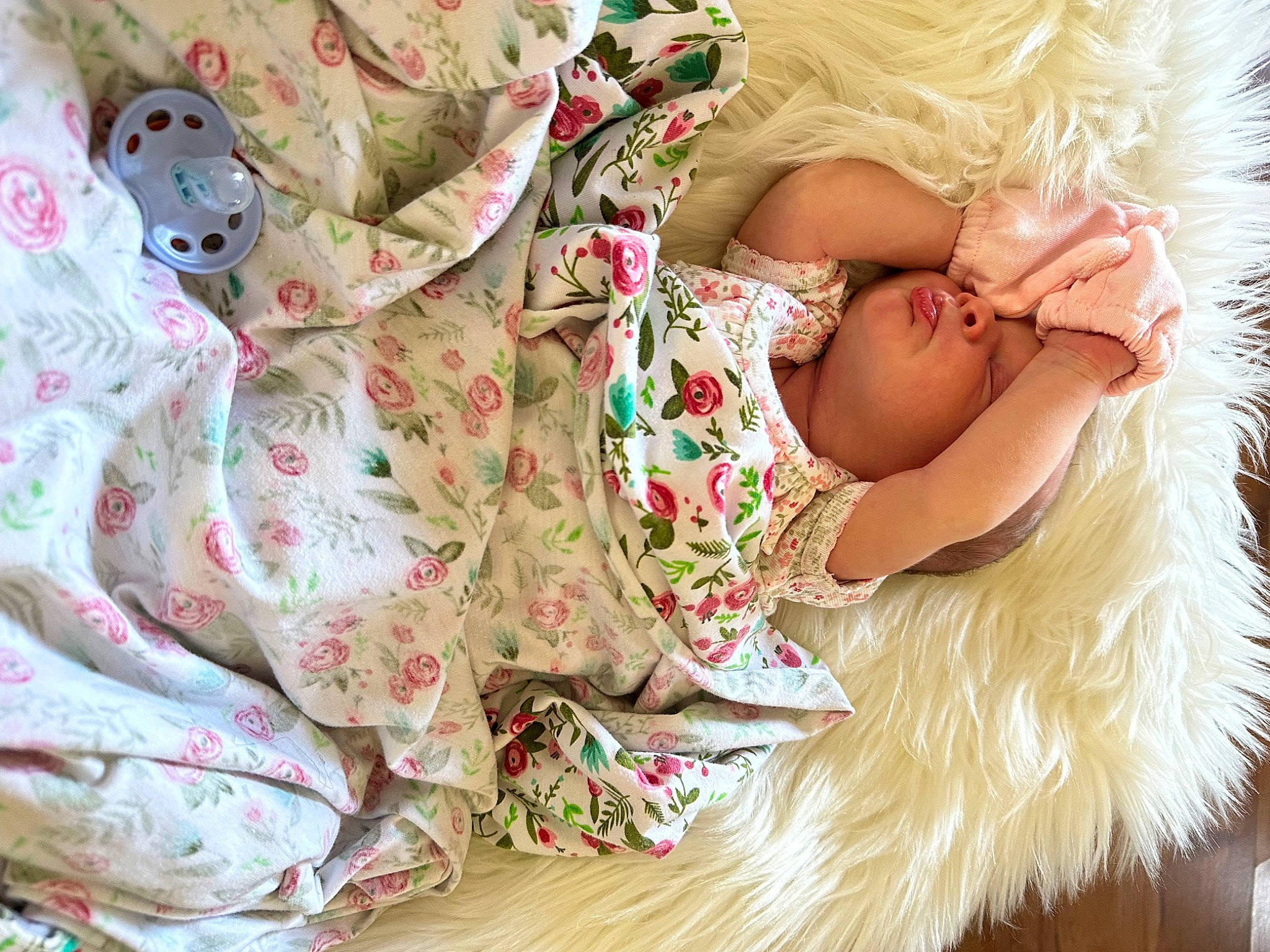 Nora Jean joined the competition — help win amazing prizes! baby, baby_products, baby_sleeping, baby_toddler_clothing, bedding, child, comfort, dress, event, happy, human_leg, linens, pattern, peach, person, sitting, sleeve, textile, thigh, toddler