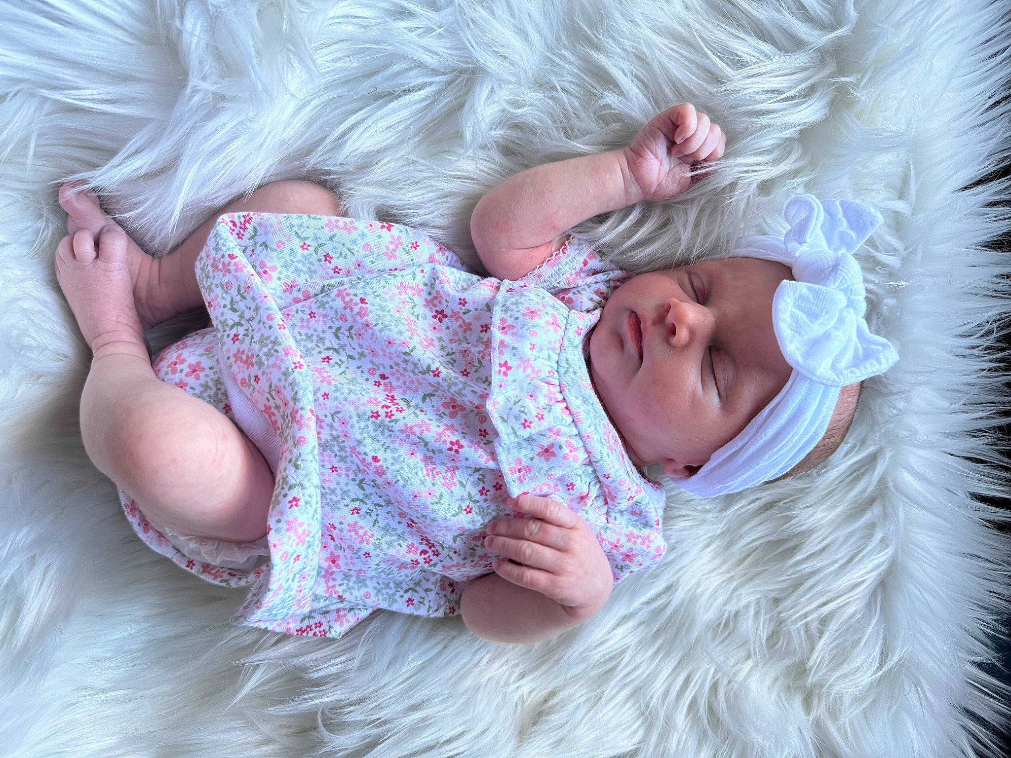 Nora Jean is registered to the contest to win money with this photo: baby, baby_toddler_clothing, child, close_up, comfort, fur, gesture, grass, hand, happy, headgear, headwear, linens, outerwear, person, pink, skin, sleeve, textile, toddler