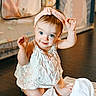 Ruby joined the competition — help win amazing prizes! accessories, baby, bodypart, clothing, dress, eveningdress, face, finger, hand, happy, hardwood, hat, head, headband, person, photography, portrait, sitting, smile, wood