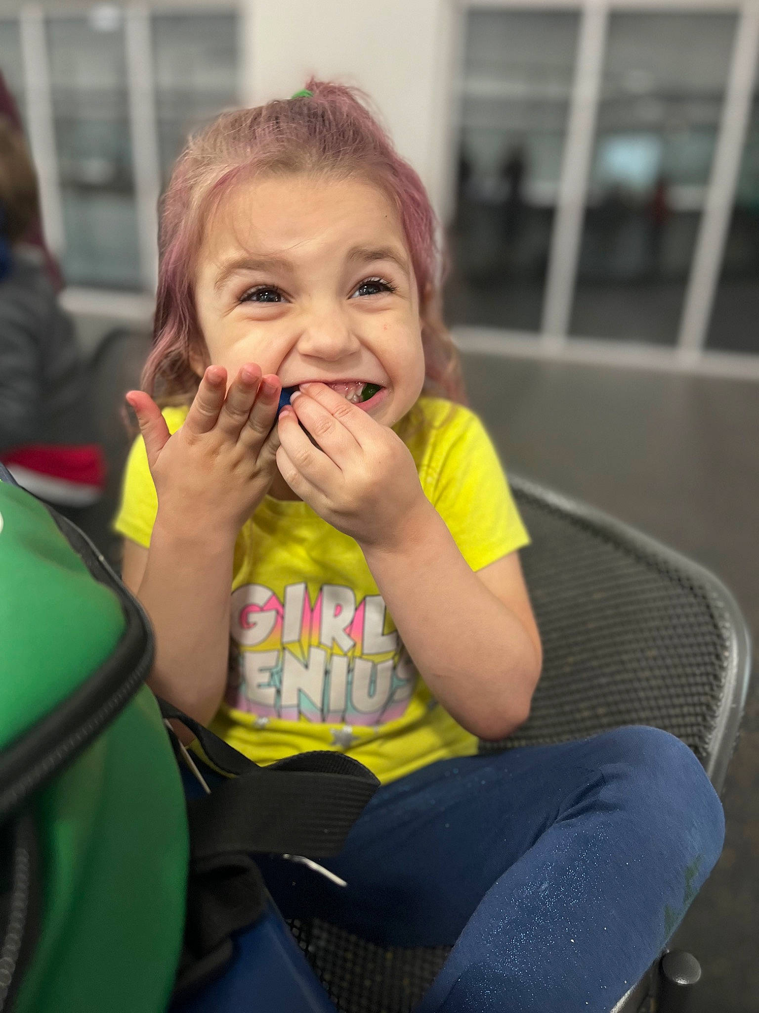 Taytum is registered to the contest to win money with this photo: chair, cheek, eye, facial_expression, finger, fun, gesture, hair, happy, iris, joy, leisure, lip, mouth, nose, person, recreation, skin, smile, thumb