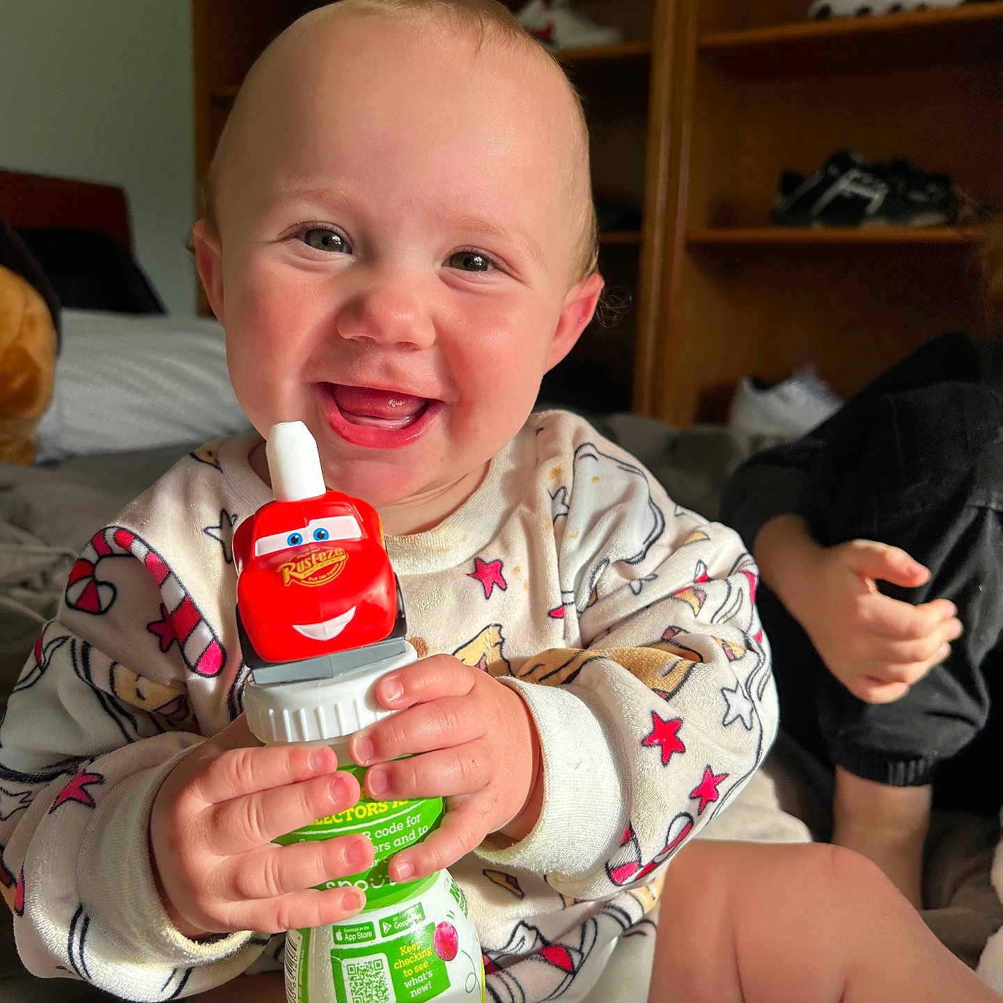 Haisley joined the competition — help win amazing prizes! baby, bodypart, bottle, cabinet, can, clothing, couch, face, finger, footwear, furniture, hand, happy, head, indoors, person, photography, portrait, shoe, tin