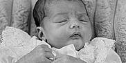 Aurora-Rose is registered to the contest to win money with this photo: baby, newborn, sleeping, black_and_white, lace, hands, face, infant, portrait, soft_texture, peaceful, closeup, cute, resting, delicate, child, monochrome, blanket, cozy, small