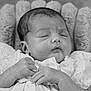 baby, newborn, sleeping, black_and_white, lace, hands, face, infant, portrait, soft_texture, peaceful, closeup, cute, resting, delicate, child, monochrome, blanket, cozy, small