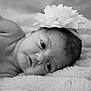 Aurora-Rose joined the competition — help win amazing prizes! baby, newborn, infant, flower_headband, black_and_white, face, skin, blanket, soft_texture, lying_down, portrait, cute, peaceful, child, closeup, head, eyes, hand, resting, sleepy