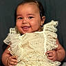adorable, baby, celebration, child, closeup, cute, dress, earrings, expression, face, fashion, hands, happy, infant, lace, person, portrait, smiling, studio, young_child