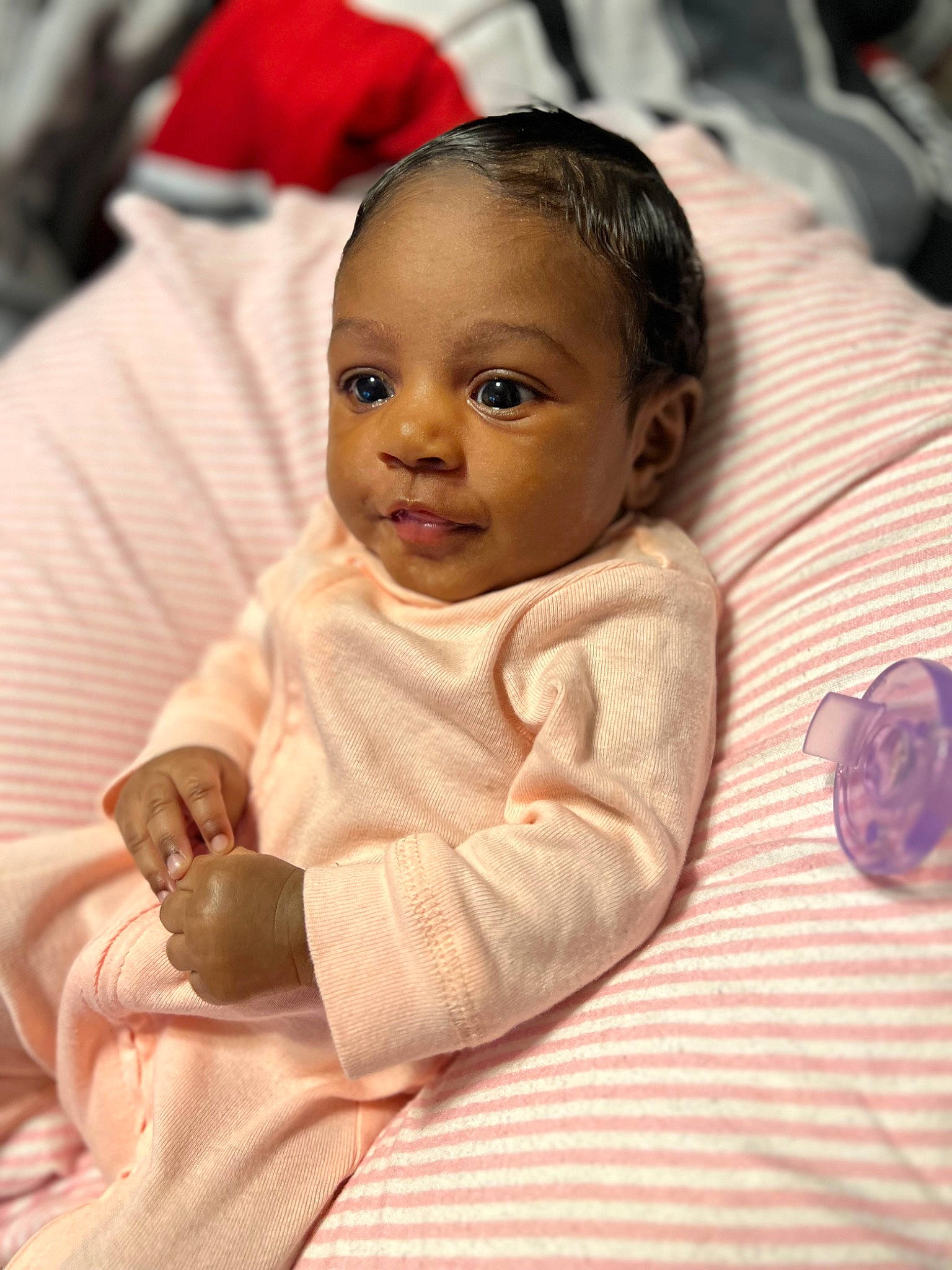 Amiri joined the competition — help win amazing prizes! baby, baby_toddler_clothing, cheek, child, comfort, event, facial_expression, finger, flooring, fun, happy, linens, nose, person, room, sitting, skin, sleeve, smile, textile