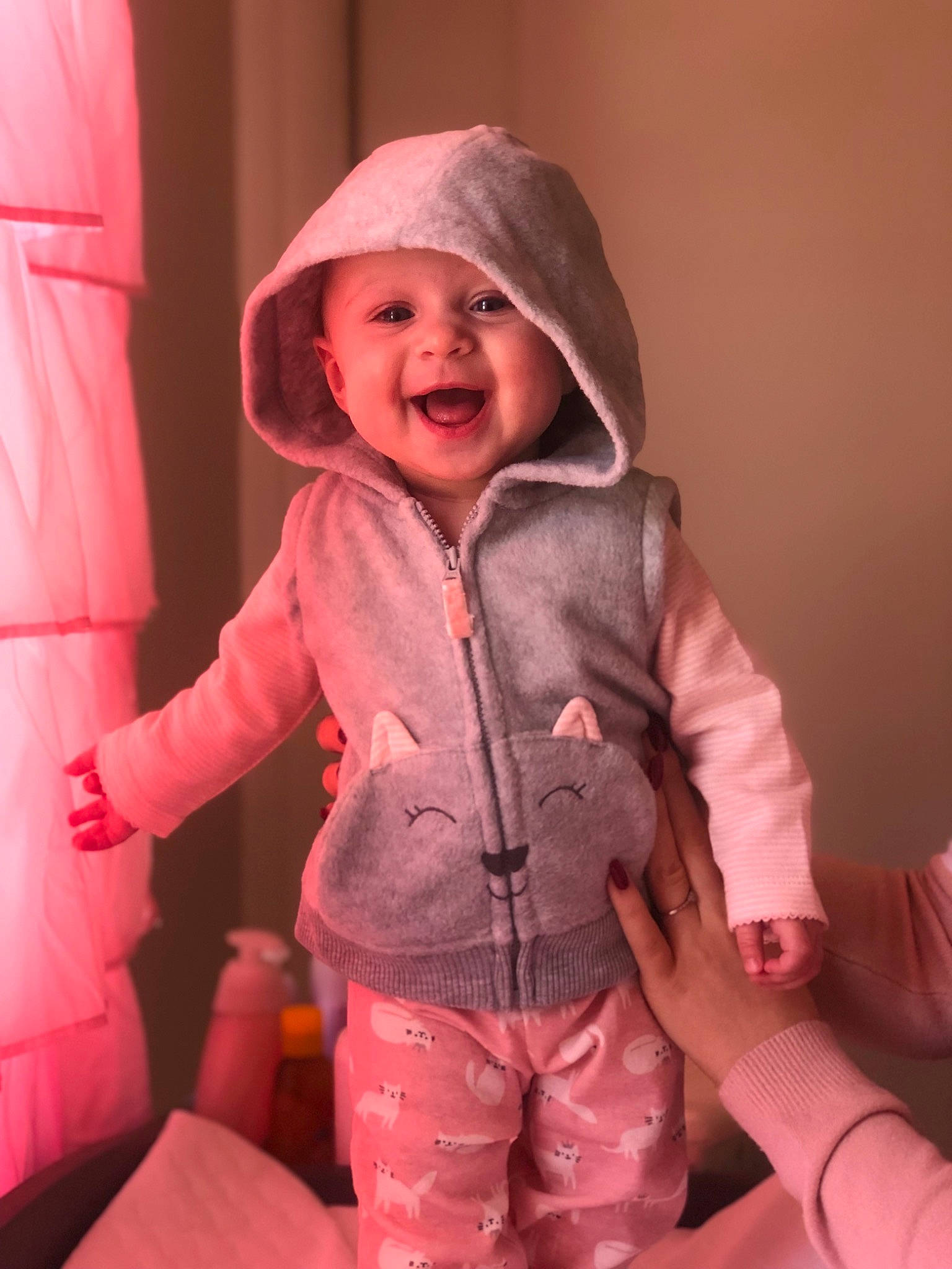 Marceline is registered to the contest to win money with this photo: child, clothing, hood, hoodie, jacket, outerwear, person, pink, sleeve, smile, toddler