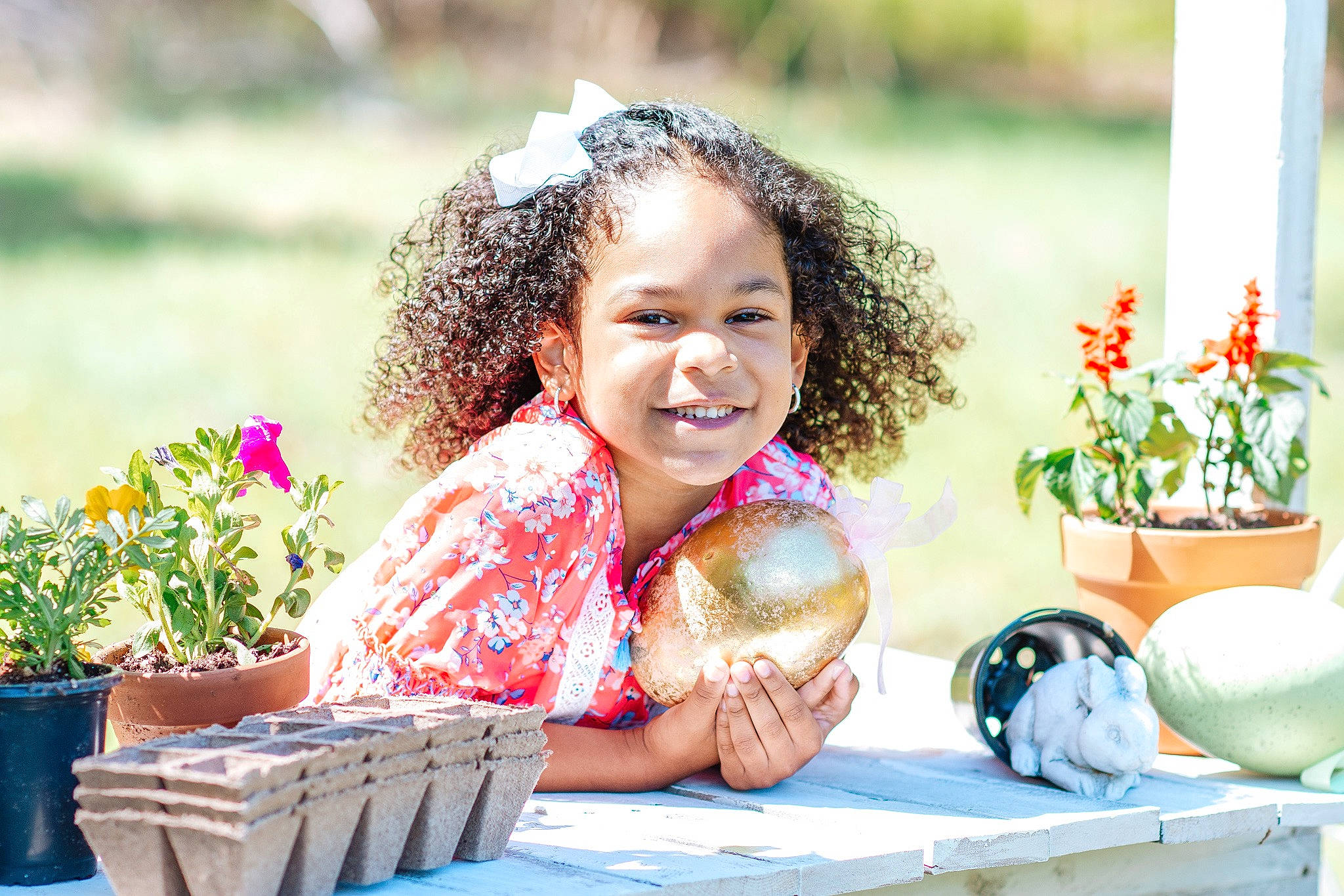 Zaira is registered to the contest to win money with this photo: botany, child, flower, garden, grass, happy, joy, person, plant, play, recreation, sitting, smile, summer, toddler, vacation