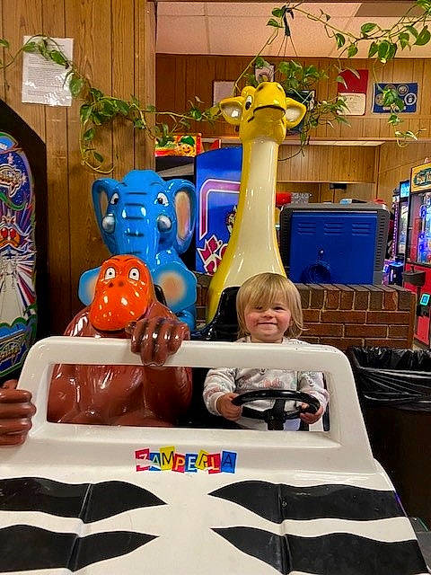 Sadie joined the competition — help win amazing prizes! art, blue, child, design, event, fun, giraffe, giraffidae, happy, hat, joy, leisure, person, public_space, recreation, room, smile, t_shirt, tree, vacation